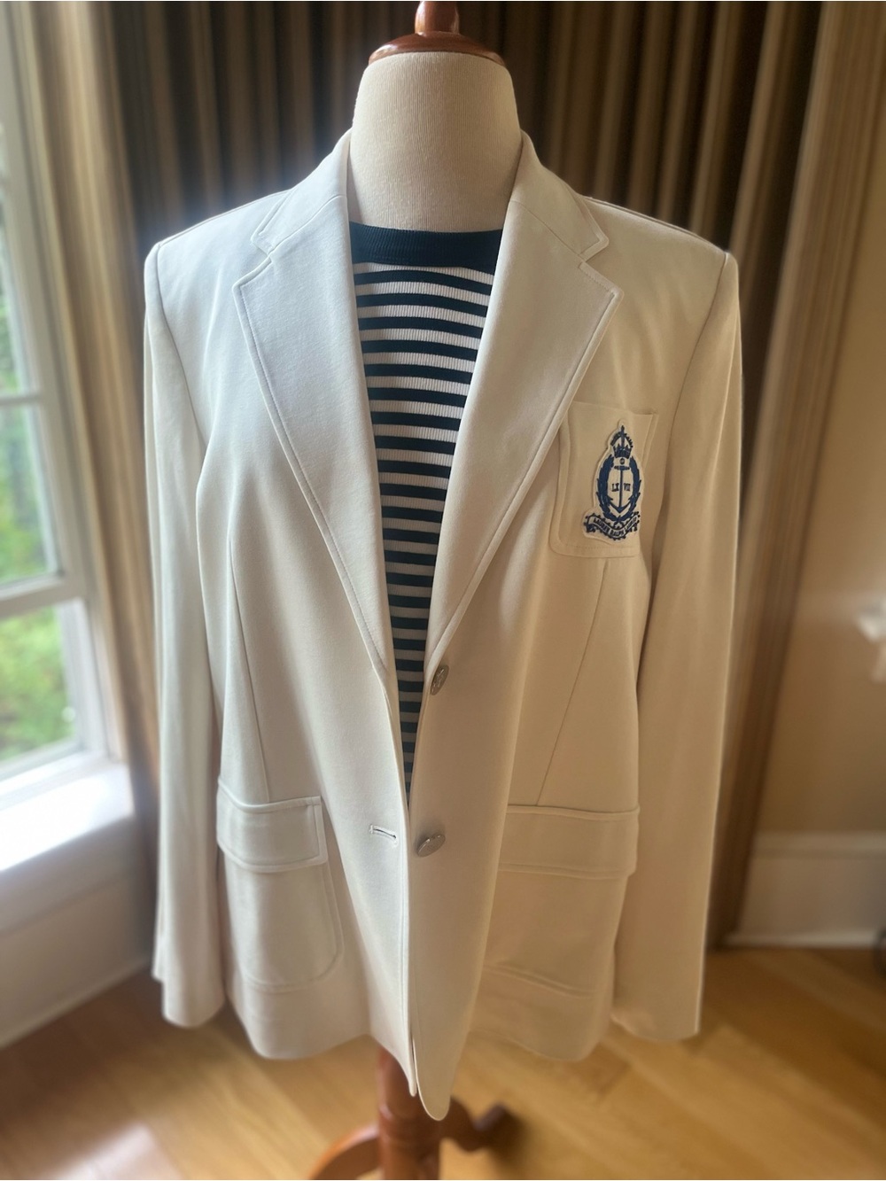 NWT- Ralph Lauren jacket featuring an embroidered crest patch.
